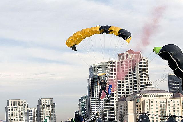 Skydiver descending toward flight deck [11-11-09] - Clint Griffin photo