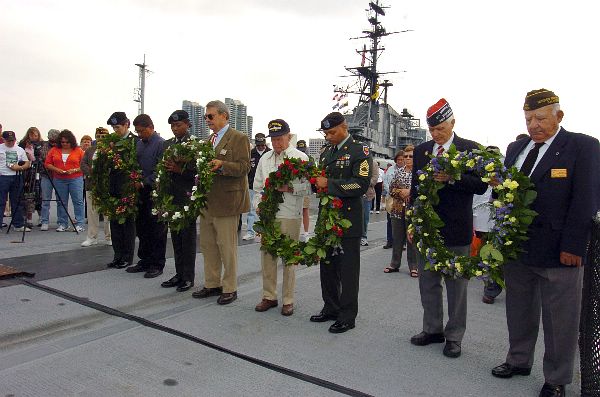5/28/05 - Military veterans observe a moment of silence to honor the fallen heroes of World War II, the Korean War, the Vietnam