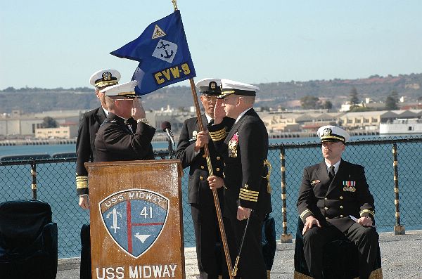 Col. Douglas P. Yurovich of the Marine Corps, assumes command of Carrier Air Wing Nine (CVW-9), during a ceremony aboard USS Mid