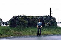 Bill Lowers in front of bunker at USN Mail Sort facility at Da Nang AFB