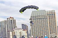 Skydiver descending toward flight deck [11-11-09] - Clint Griffin photo