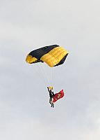 Skydiver descending toward flight deck [11-11-09] - Clint Griffin photo