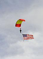 Skydiver preparing to land on flight deck [11-11-09] - Clint Griffin photo