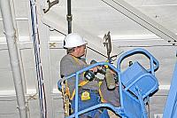 Installing angle brackets to hold Bird Dog airplane [02-22-10] - Clint Griffin Photo