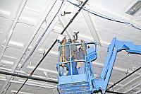 Installing angle brackets to hold Bird Dog airplane [02-22-10] - Clint Griffin Photo
